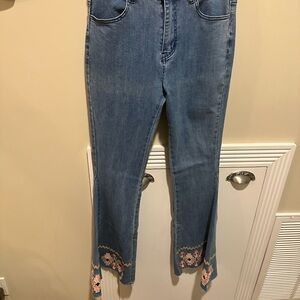 Elegant Blue Flare Jeans with Embroidered Details